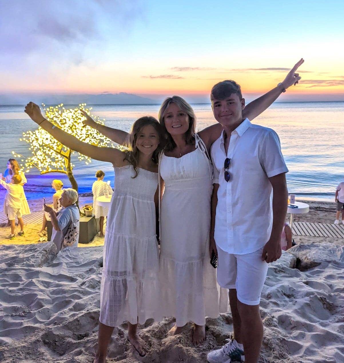 family at white party Sani Resort